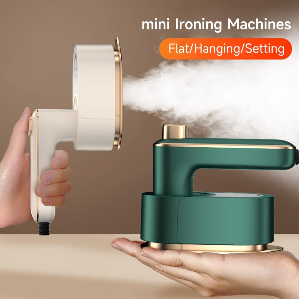 Mini ironing machine with steam being emitted, held by a hand against a beige background.