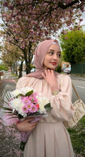Aisha K.
