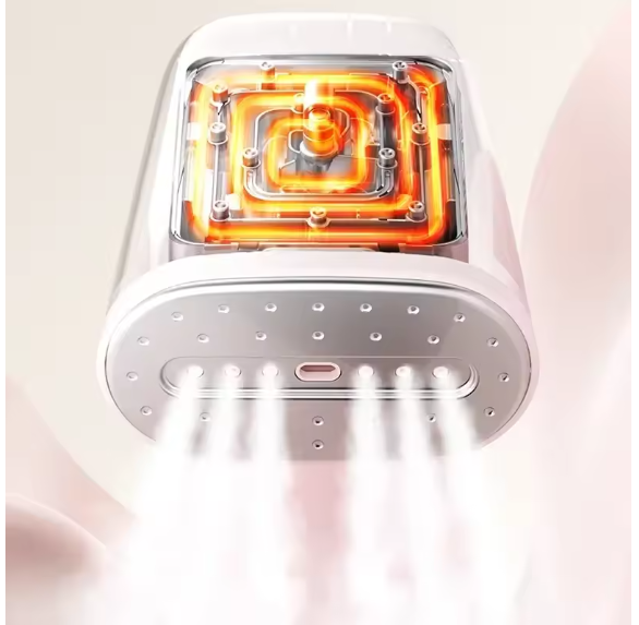 White electronic device with glowing orange interior on a light pink background