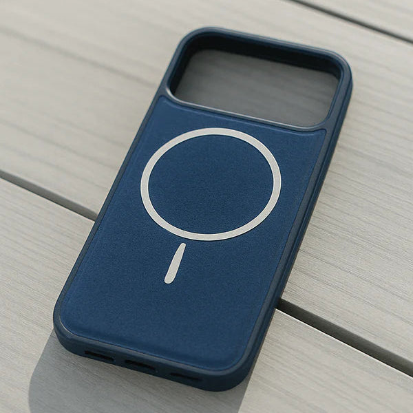 Blue phone case with a white circular design on a wooden surface