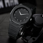 Black wristwatch with a unique design on a dark background