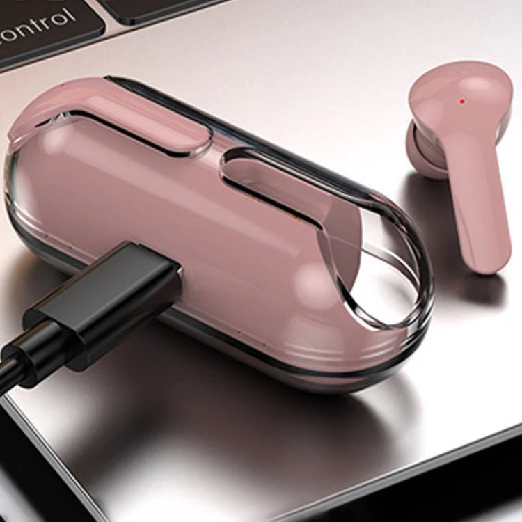 Pink wireless earbuds with charging case on a reflective surface