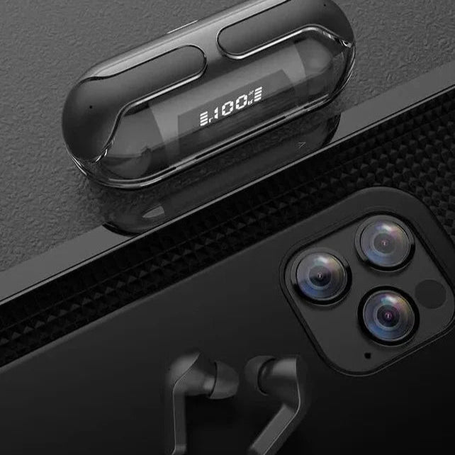 Black wireless earbuds with charging case on a black surface