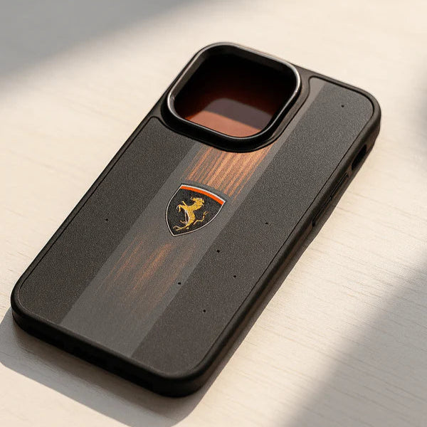 Phone case with Ferrari logo on a light surface