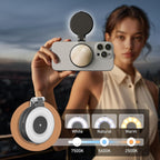 Camera with 3 mode and scroll wheel control for brightness, held by a person with scenic background.