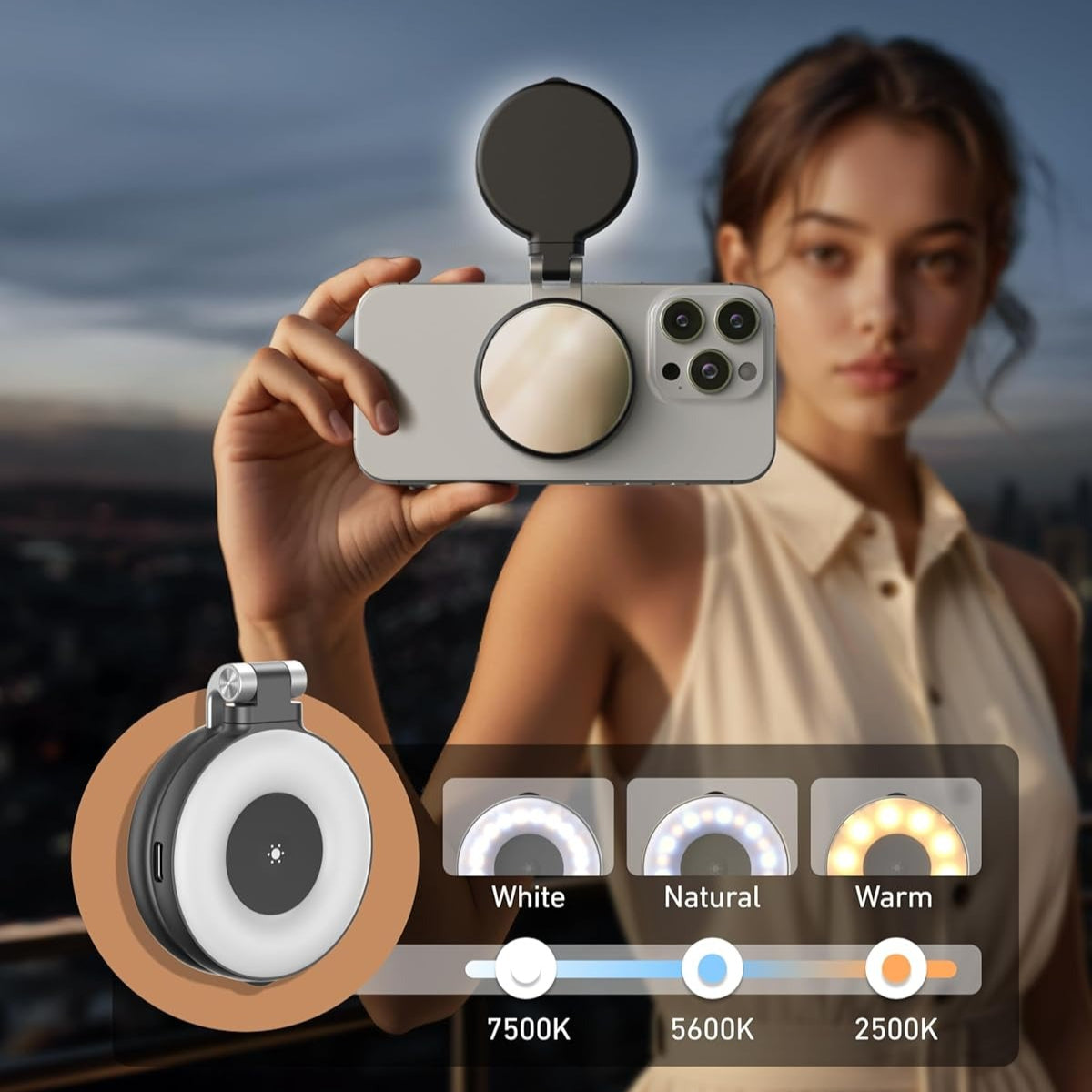 Camera with 3 mode and scroll wheel control for brightness, held by a person with scenic background.